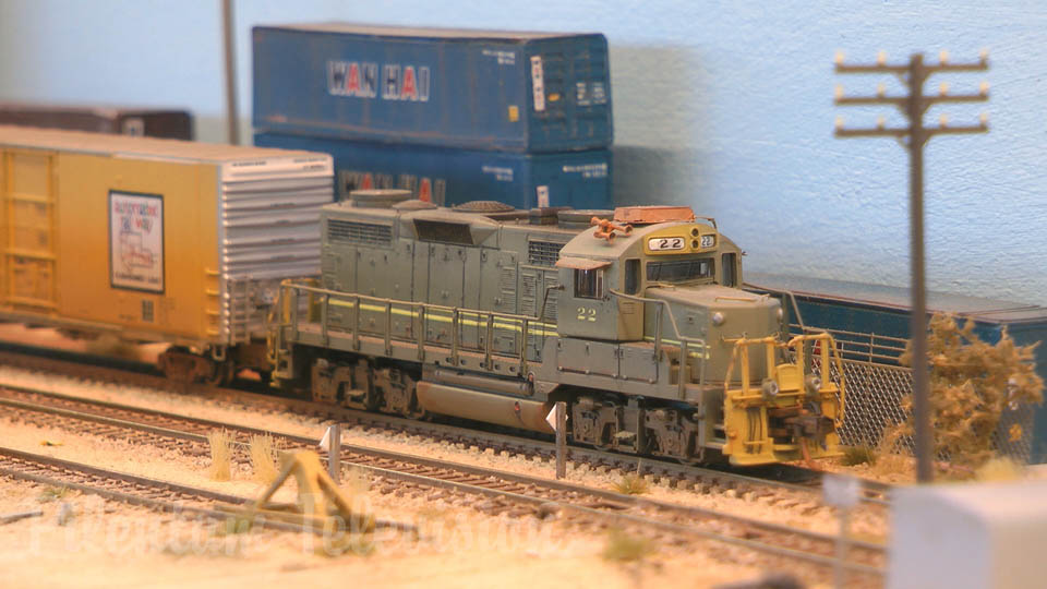 N scale model railroad diorama with freight trains