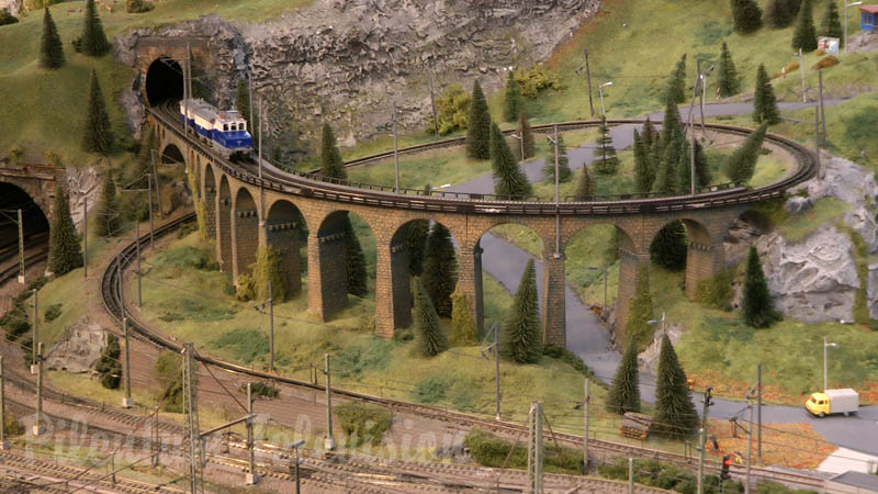 Model Railroad Layout by Modelspoor Group Nienoord with Miniature Cars and more than 100 Trains in HO Scale