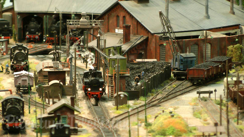 Model Railroad Layout with Steam Locomotive Depot in World War II