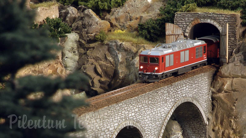 Model trains in action at the famous Gletsch railway station in Switzerland