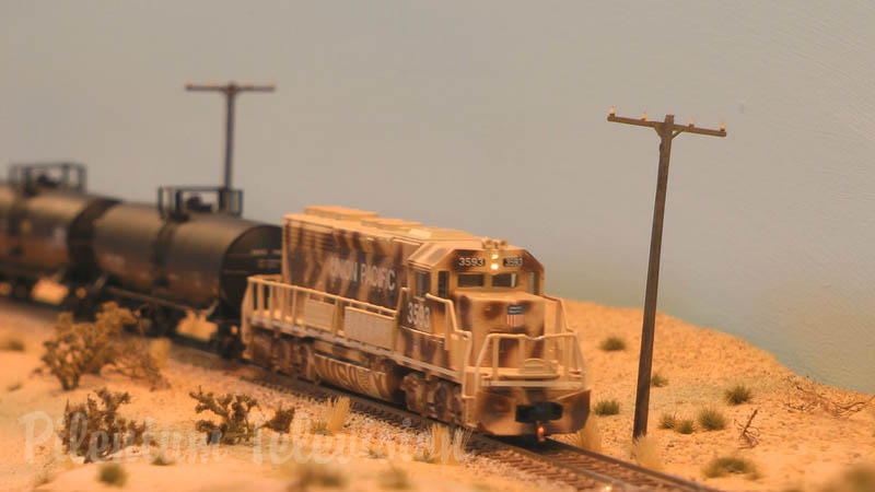 N scale model railroad diorama with freight trains