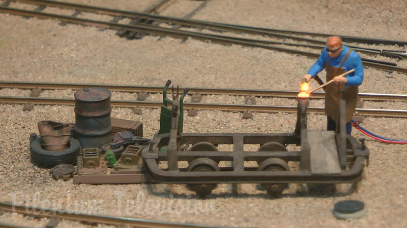 Model Railroad Layout in O Scale with Narrow Gauge Steam Locomotives and Diesel Railcars