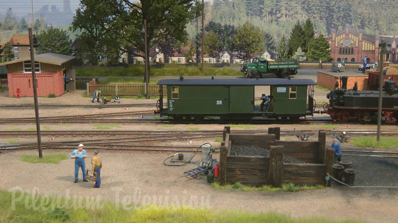 Model Railroad Layout in O Scale with Narrow Gauge Steam Locomotives and Diesel Railcars