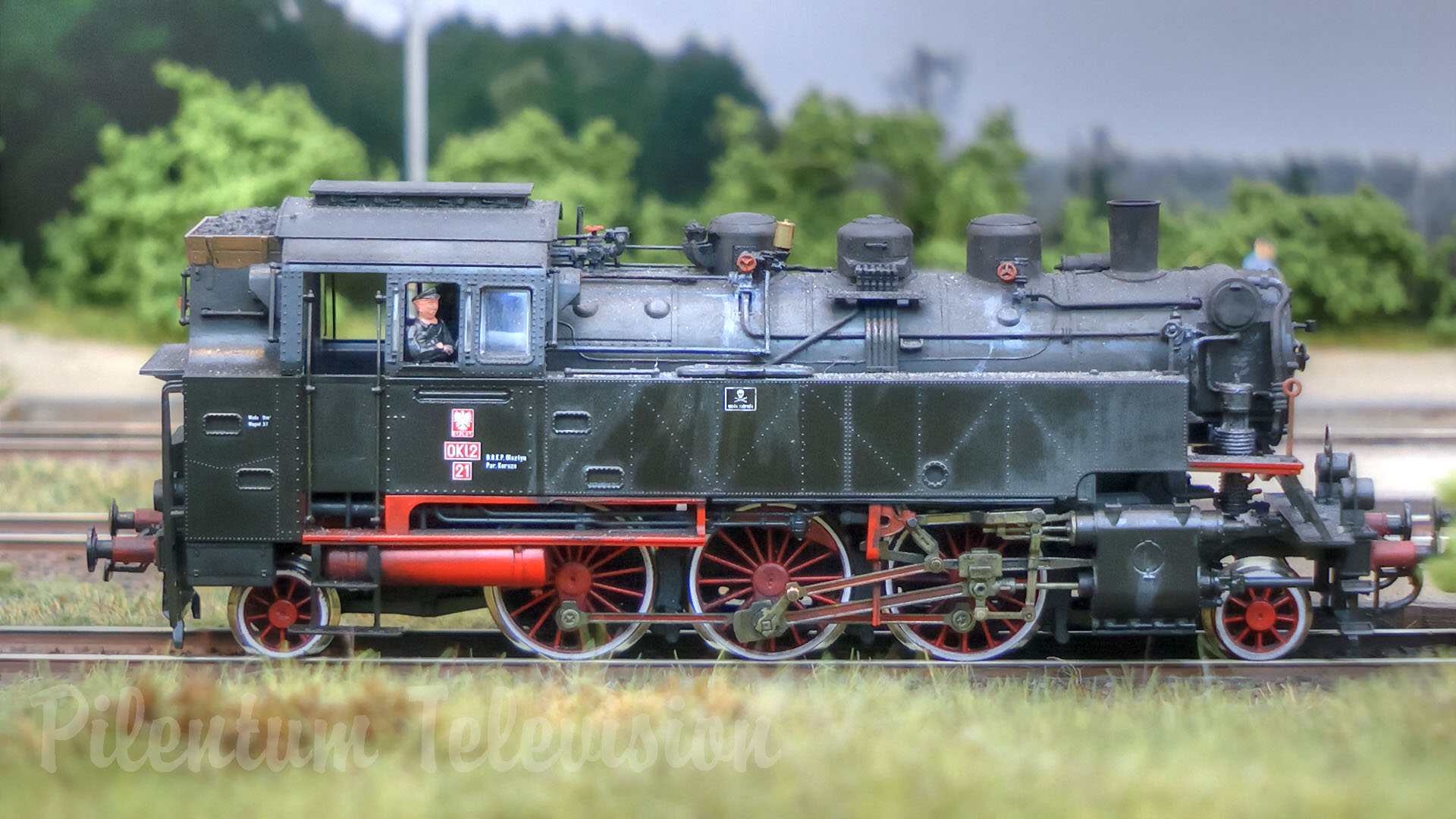 Model railroad layout of Zielona railway station with steam locomotives of the Polish State Railways