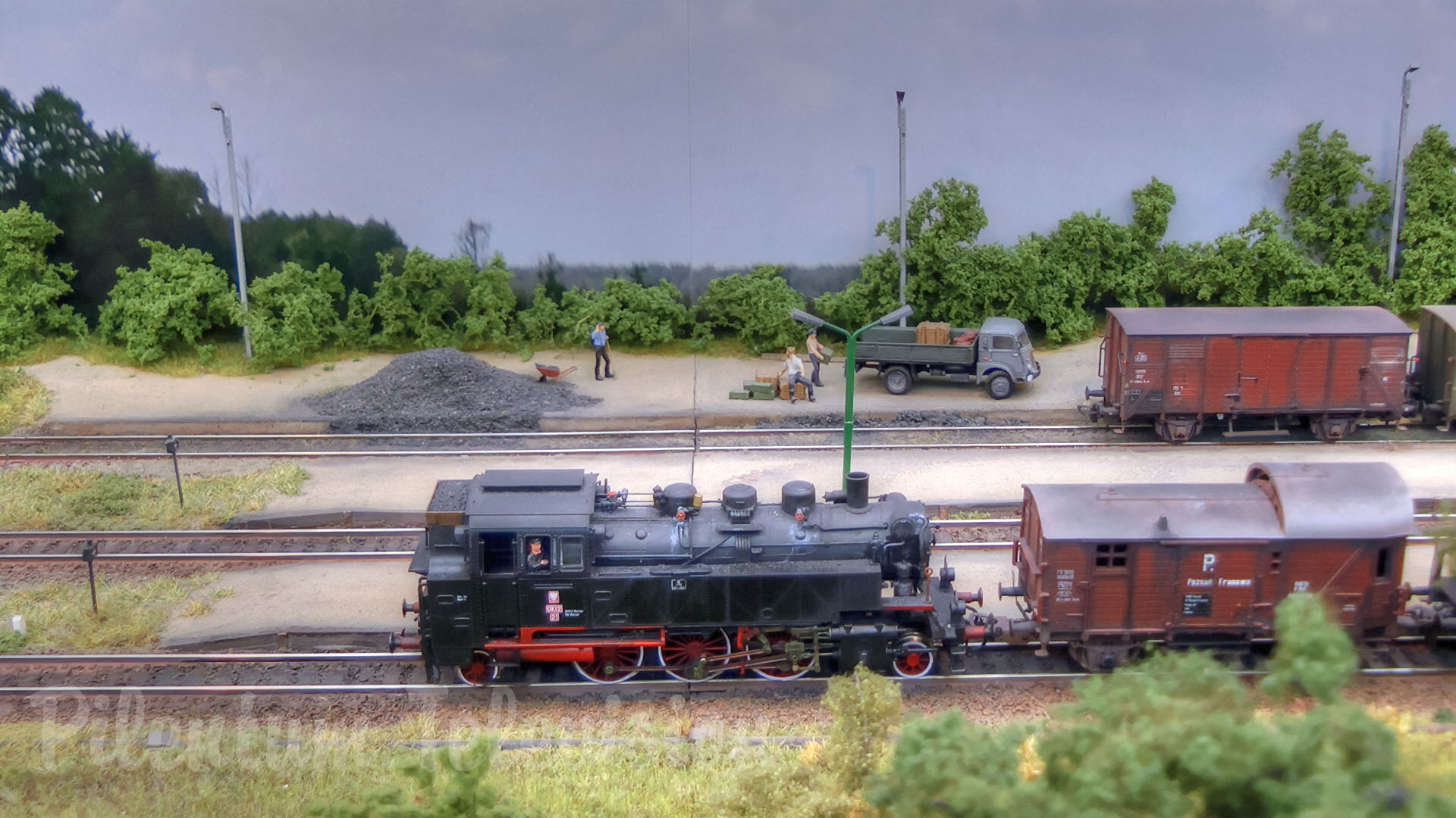 Model railroad layout of Zielona railway station with steam locomotives of the Polish State Railways