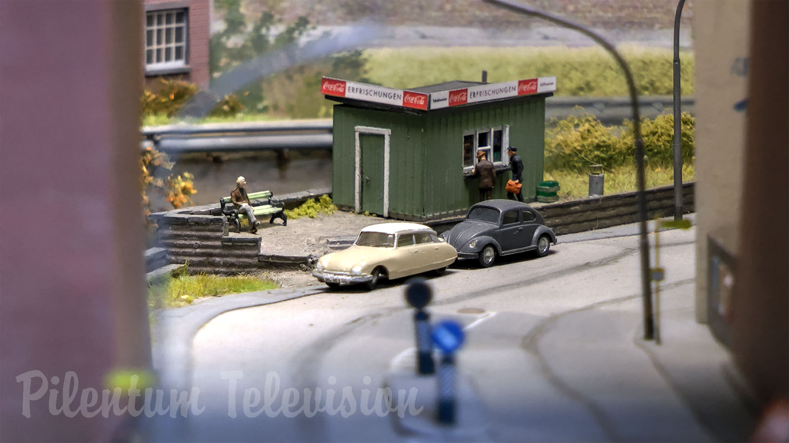 N scale model train layout with Magnorail miniature cars and locomotives by Arnold and Hobbytrain