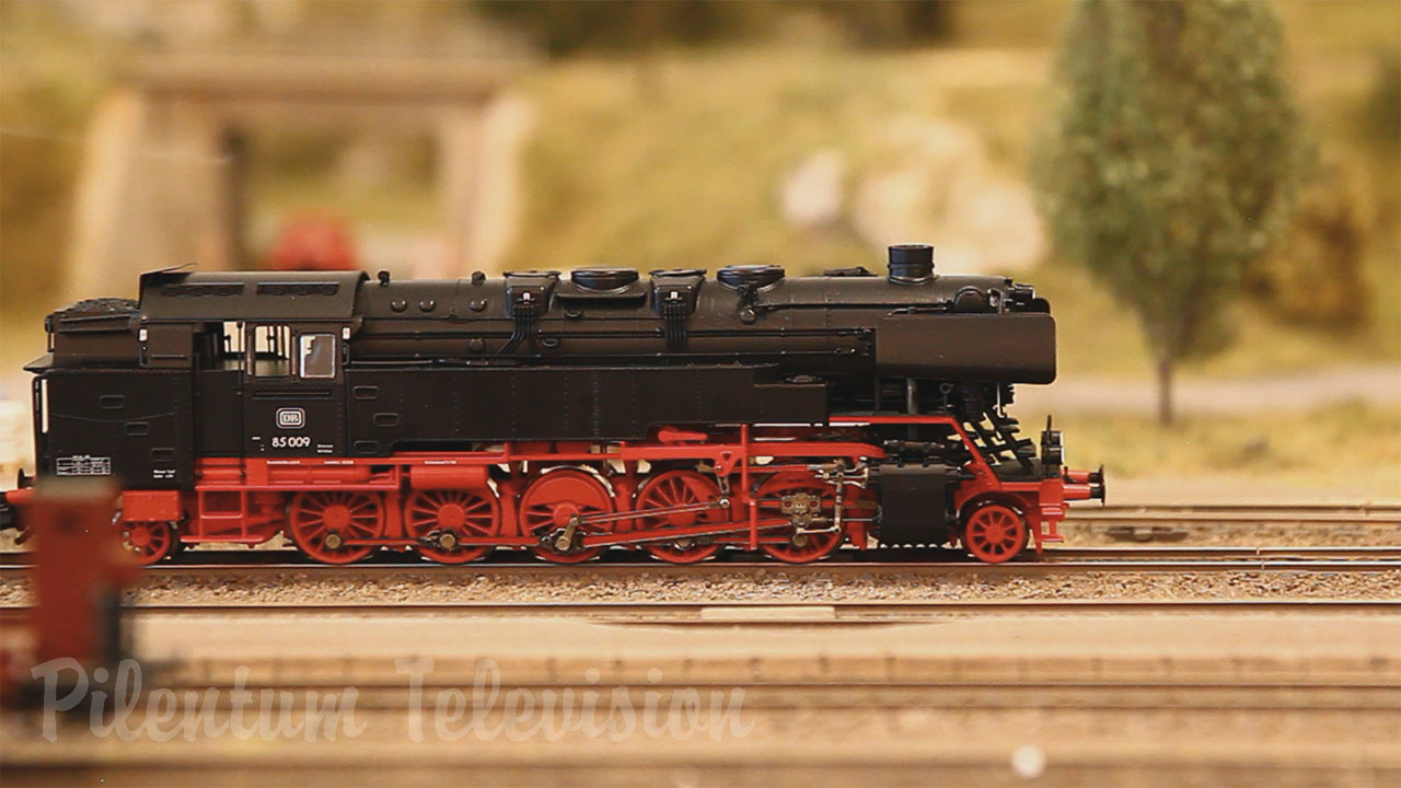 A pretty nice model railway in HO scale with smoking steam locomotives