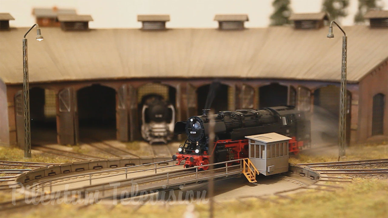 A pretty nice model railway in HO scale with smoking steam locomotives