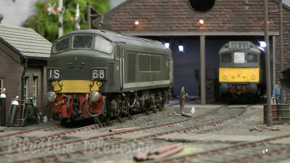 Maquette ferroviaire à l'échelle 0 avec trains miniatures et locomotives diesel